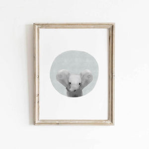 Baby Elephant illustration set against a light blue circle by artist Leah Straatsma